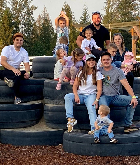 Guests Pose For Photo On Tire Mountain